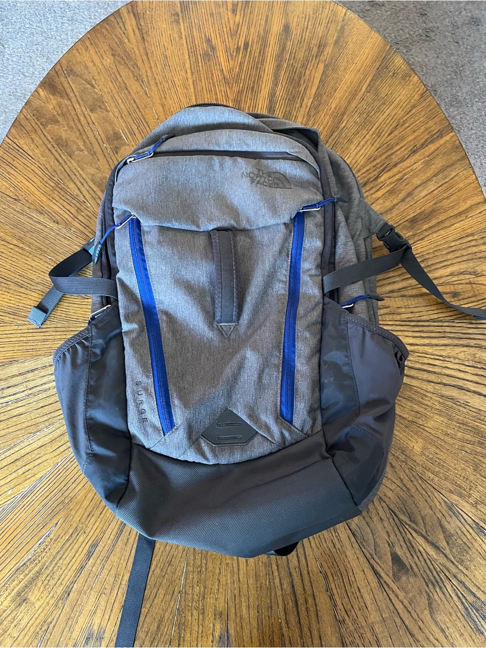 The North Face Surge Flexvent Gray Backpack with Blue Trim and Laptop Sleeve
